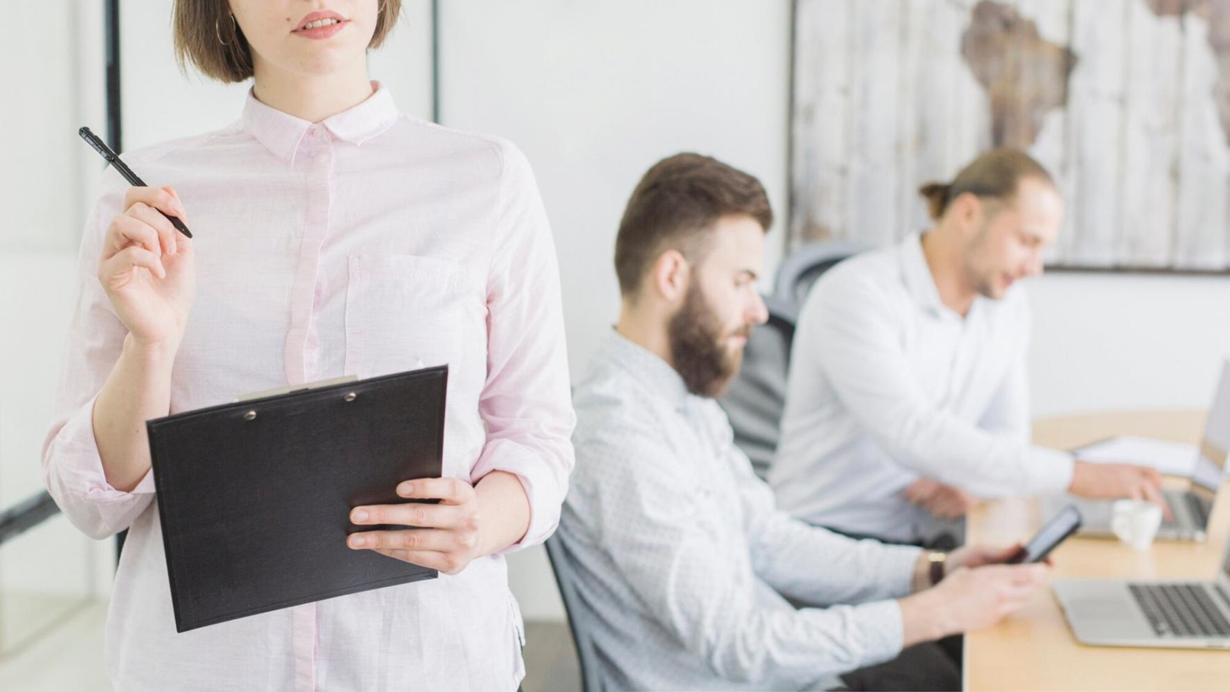 Person reviewing financial documents and planning budget